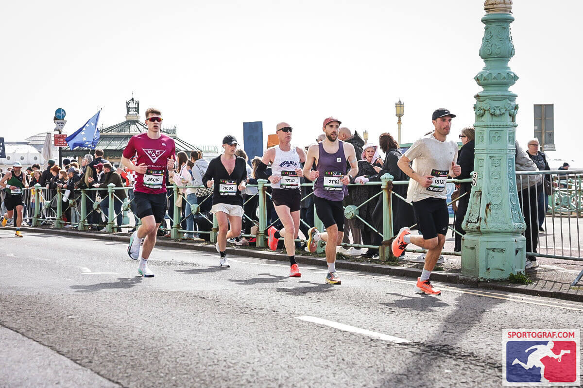 Me and 4 other runners running along Kingsway, with the Palace Pier in the background
