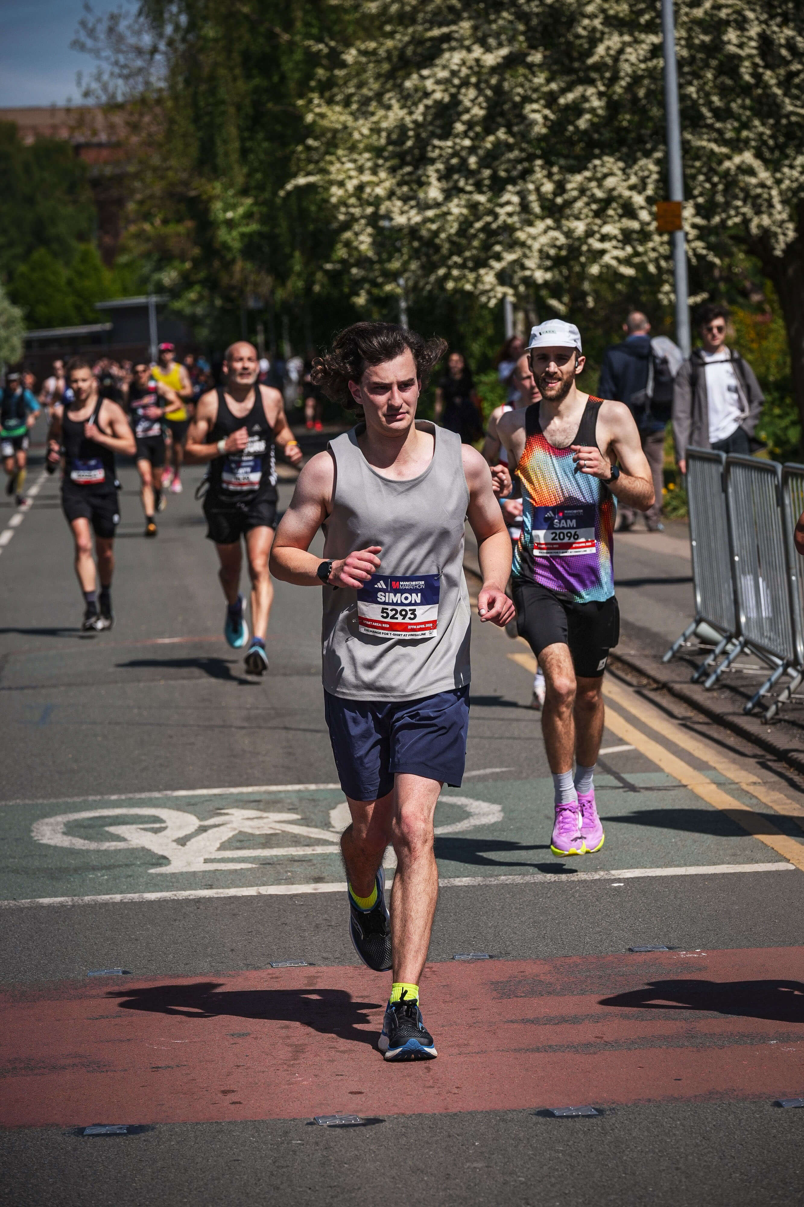 Runners grinding out the final few kilometres of Manchester Marathon