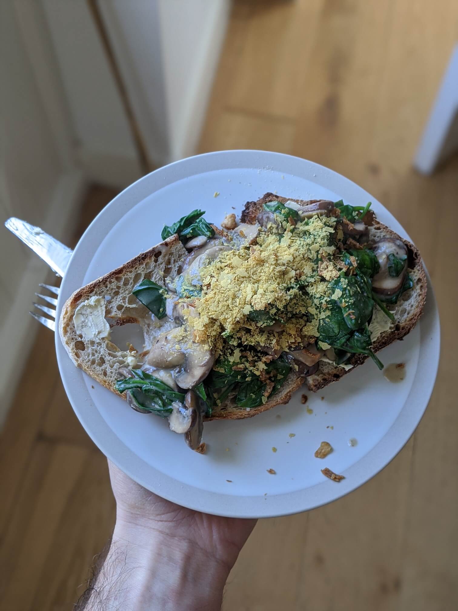 Miso, mushroom, coconut and spinach on sliced toast