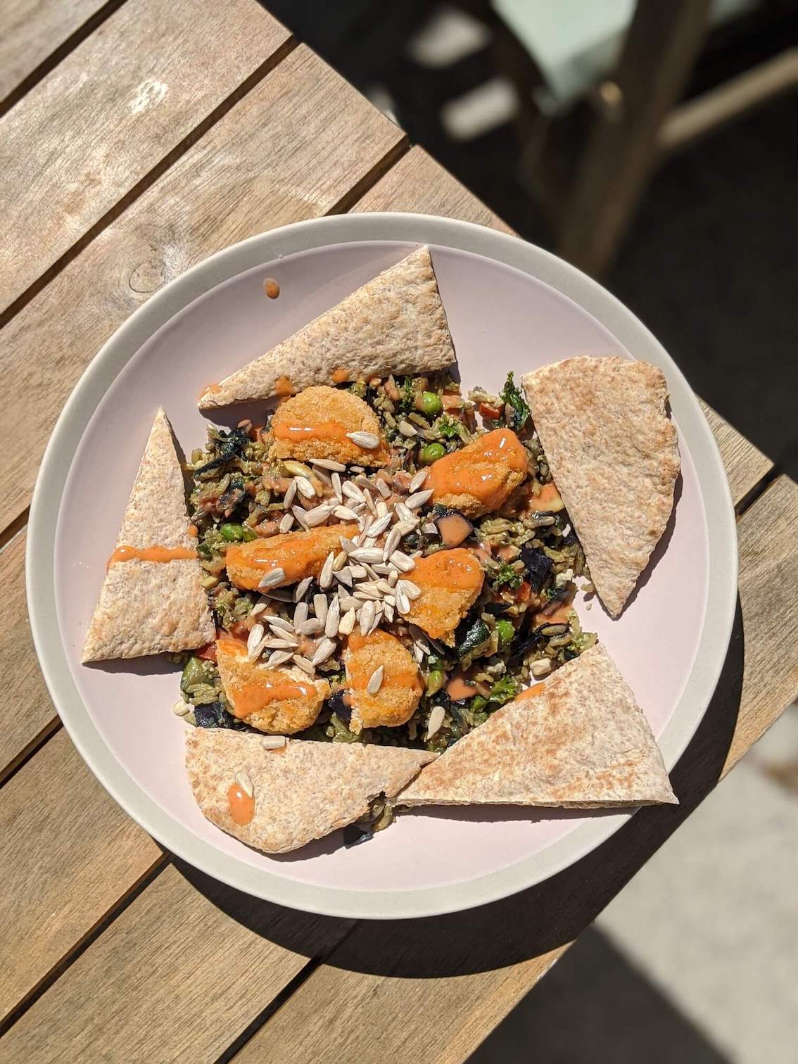 Veg rice, nuggets, wholemeal pitta, seeds